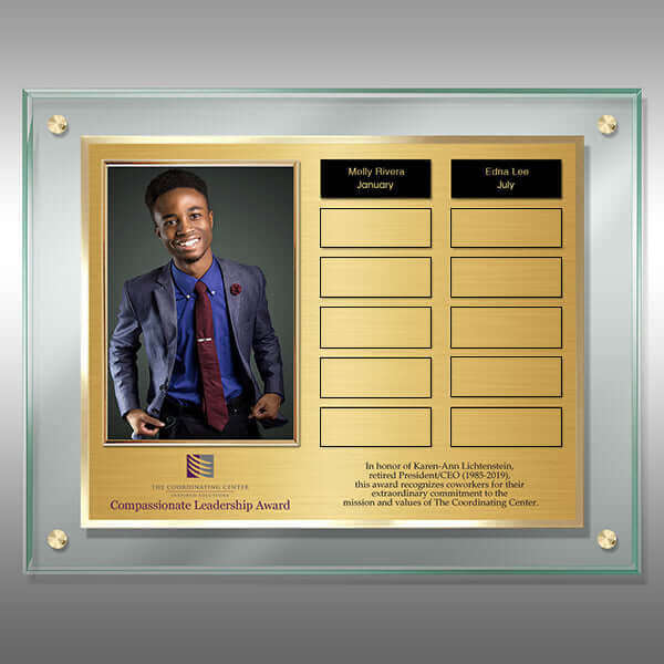 Contemporary perpetual plaque featuring jade acrylic board, gold imprint plates, centered photo frame, and corner chrome stand-offs